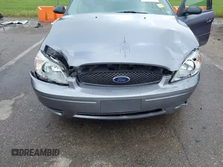 2006 Ford Taurus SE z VIN 1FAFP53U56A253230, wystawiony jako IAAI lot #42247009 z przebiegiem 85 913 mil mil oraz . Historia ofert i sprzedaży dostępna na DreamBid. Obrazek 6.