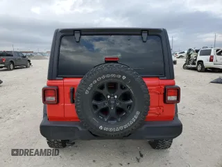 2023 Jeep Wrangler Sport with VIN 1C4HJXDG3PW584885, listed as a Copart auction lot 86057344 with 13,504 mi miles and Salvage Title. Bid and sale history available at DreamBid. Image 6.