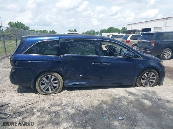 2015 Honda Odyssey Touring Elite with VIN 5FNRL5H96FB039538, listed as a IAAI auction lot 41877882 with 136,007 mi miles. Bid and sale history available at carsss.com. Image 13.