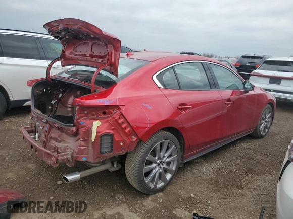 2019 Mazda 3 Premium with VIN 3MZBPAEM6KM103409, listed as a Copart auction lot 51947795 with 100,986 mi miles and Salvage Title. Bid and sale history available at DreamBid. Image 3.