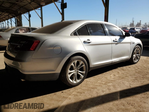 2013 Ford Taurus SEL with VIN 1FAHP2E86DG102656, listed as a Copart auction lot 50393805 with 212,804 mi miles and Clean Title. Bid and sale history available at carsss.com. Image 3.