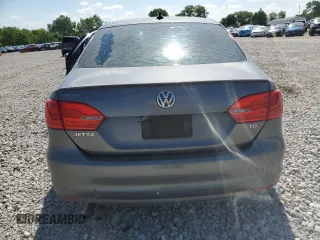 2012 Volkswagen Jetta TDI w/Premium & Nav z VIN 3VWLL7AJ2CM358901, wystawiony jako Copart lot #57350505 z przebiegiem 155 062 mil mil oraz Szkoda całkowita • Salvage title. Historia ofert i sprzedaży dostępna na DreamBid. Obrazek 6.