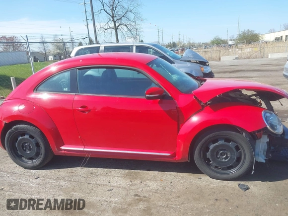 2012 Volkswagen Beetle 2.5L w/Sound/Nav PZEV with VIN 3VWJP7AT6CM620285, listed as a IAAI auction lot 42094101 with 125,737 mi miles and . Bid and sale history available at DreamBid. Image 13.