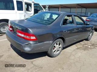 2001 Lexus ES 300 with VIN JT8BF28G910341451, listed as a IAAI auction lot 41776563 with 183,803 mi miles and . Bid and sale history available at DreamBid. Image 4.