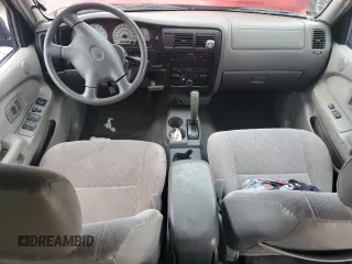 2001 Toyota Tacoma PreRunner z VIN 5TEGN92N11Z767936, wystawiony jako Copart lot #55452935 z przebiegiem 301 314 mil mil oraz Szkoda całkowita • Salvage title. Historia ofert i sprzedaży dostępna na DreamBid. Obrazek 8.