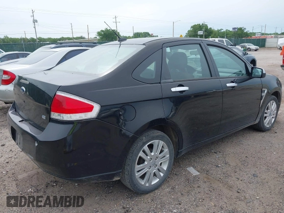 2008 Ford Focus SE z VIN 1FAHP35N88W201941, wystawiony jako IAAI lot #42209632 z przebiegiem 115 901 mil mil oraz . Historia ofert i sprzedaży dostępna na DreamBid. Obrazek 4.