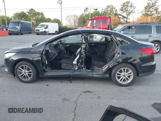 2017 Ford Focus SE with VIN 1FADP3FE7HL298287, listed as a IAAI auction lot 41870698 with Not Provided miles and . Bid and sale history available at carsss.com. Image 13.