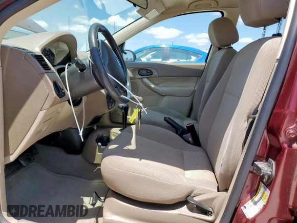 2007 Ford Focus S z VIN 1FAFP34NX7W324146, wystawiony jako Copart lot #59006755 z przebiegiem 160 398 mil mil oraz Szkoda całkowita • Salvage title. Historia ofert i sprzedaży dostępna na DreamBid. Obrazek 7.