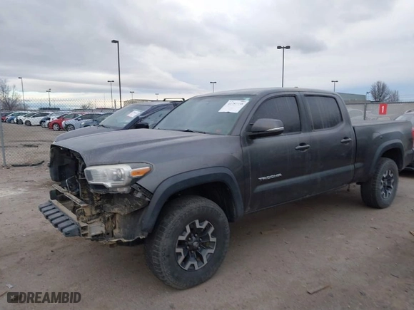 2016 Toyota Tacoma SR5 with VIN 3TMDZ5BN3GM010607, listed as a IAAI auction lot 41757738 with 154,686 mi miles. Bid and sale history available at carsss.com. Image 2.
