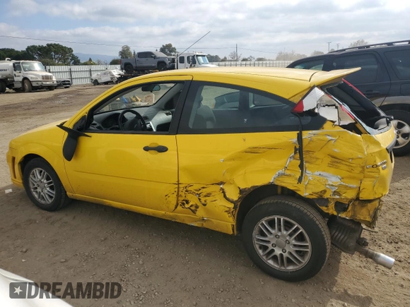 2007 Ford Focus S with VIN 1FAHP31N57W213310, listed as a Copart auction lot 43433425 with 184,433 mi miles and Salvage Title. Bid and sale history available at DreamBid. Image 2.