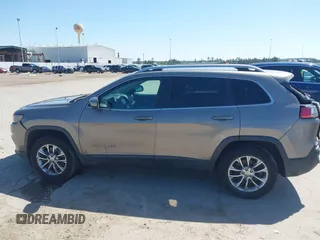 2019 Jeep Cherokee Latitude Plus with VIN 1C4PJMLBXKD233749, listed as a IAAI auction lot 41937698 with 103,988 mi miles and . Bid and sale history available at DreamBid. Image 15.