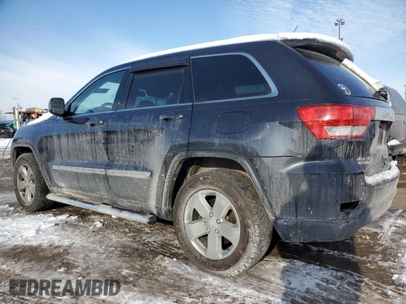 2012 Jeep Grand Cherokee Laredo with VIN 1C4RJFAG9CC340706, listed as a Copart auction lot 45512045 with 244,664 mi miles and Salvage Title. Bid and sale history available at carsss.com. Image 2.