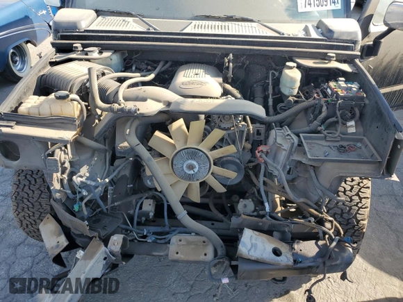 2004 Hummer H2 with VIN 5GRGN23U24H104327, listed as a Copart auction lot 74150914 with 181,933 mi miles and Salvage Title. Bid and sale history available at carsss.com. Image 12.