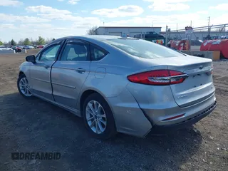 2020 Ford Fusion SE z VIN 3FA6P0LU8LR163896, wystawiony jako IAAI lot #41994803 z przebiegiem 89 892 mil mil oraz . Historia ofert i sprzedaży dostępna na DreamBid. Obrazek 3.