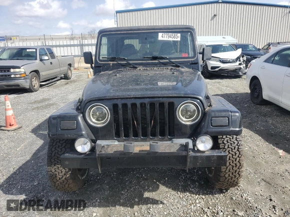 1997 Jeep Wrangler Sahara with VIN 1J4FY49S2VP495910, listed as a Copart auction lot 47794585 with 147,420 mi miles and Salvage Title. Bid and sale history available at carsss.com. Image 5.