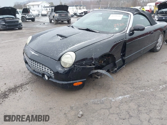 2003 Ford Thunderbird Deluxe z VIN 1FAHP60A53Y102920, wystawiony jako IAAI lot #41228106 z przebiegiem 90 854 mil mil oraz . Historia ofert i sprzedaży dostępna na DreamBid. Obrazek 6.