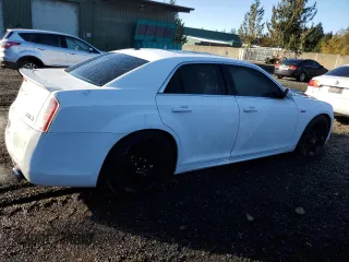 2012 Chrysler 300 SRT8 with VIN 2C3CCAFJXCH800416, listed as a Copart auction lot 77281254 with 182,398 mi miles and Clean Title. Bid and sale history available at carsss.com. Image 3.