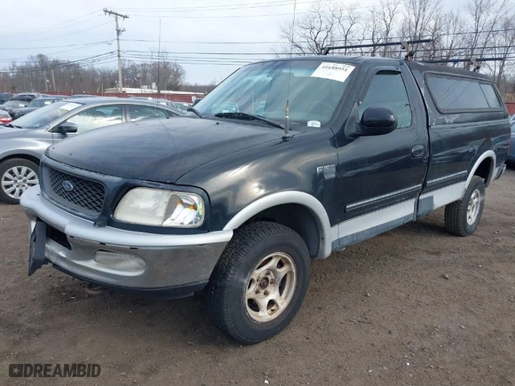 1998 Ford F-150 Standard with VIN 1FTZF18W0WNC16138, listed as a IAAI auction lot 41688951 with 354,669 mi miles. Bid and sale history available at carsss.com. Image 2.