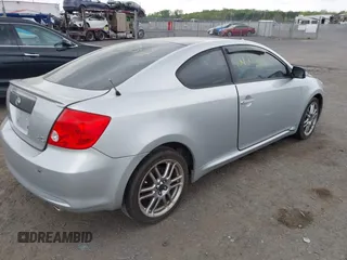 2005 Scion tC with VIN JTKDE177050032815, listed as a IAAI auction lot 42123702 with 228,973 mi miles. Bid and sale history available at carsss.com. Image 4.