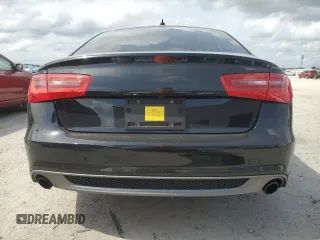 2014 Audi A6 Prestige z VIN WAUHGAFC8EN062243, wystawiony jako Copart lot #54622005 z przebiegiem 106 729 mil mil oraz Szkoda całkowita • Salvage title. Historia ofert i sprzedaży dostępna na DreamBid. Obrazek 6.