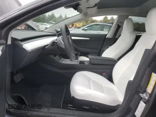 2023 Tesla Model 3 with VIN 5YJ3E1EA3PF672023, listed as a Copart auction lot 57571645 with 18,115 mi miles and Salvage title. Bid and sale history available at DreamBid. Image 7.