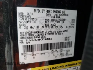 2012 Lincoln Navigator z VIN 5LMJJ3J58CEL08952, wystawiony jako Copart lot #57783665 z przebiegiem 185 263 mil mil oraz Szkoda całkowita • Salvage title. Historia ofert i sprzedaży dostępna na DreamBid. Obrazek 13.