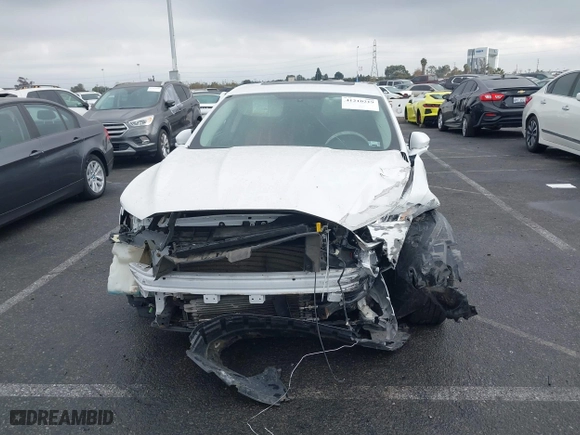 2015 Ford Fusion Titanium Hybrid with VIN 3FA6P0RU3FR247118, listed as a IAAI auction lot 41210219 with 143,348 mi miles. Bid and sale history available at carsss.com. Image 12.