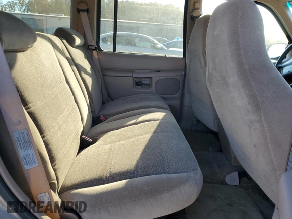 1999 Ford Explorer XL with VIN 1FMZU34X2XUA28059, listed as a Copart auction lot 77668294 with 131,064 mi miles and Salvage title. Bid and sale history available at DreamBid. Image 10.