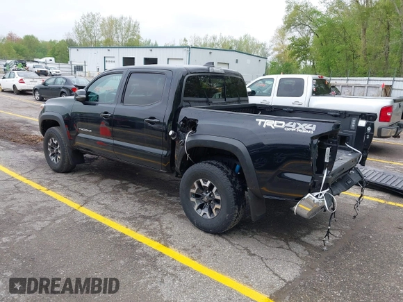 2021 Toyota Tacoma SR with VIN 3TMCZ5AN0MM417261, listed as a IAAI auction lot 42240693 with 38,625 mi miles and . Bid and sale history available at DreamBid. Image 3.