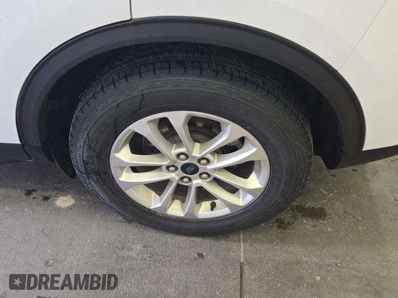 2020 Ford Escape SE with VIN 1FMCU9G68LUB25725, listed as a IAAI auction lot 42773960 with 91,597 mi miles and . Bid and sale history available at DreamBid. Image 7.