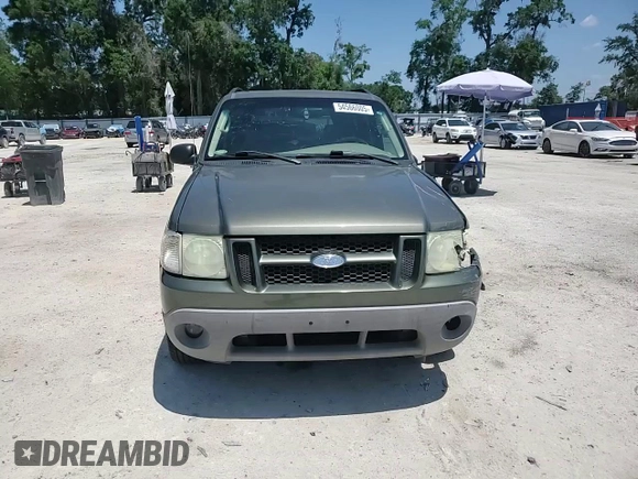2003 Ford Explorer Sport XLS z VIN 1FMYU60E53UA78241, wystawiony jako Copart lot #54566005 z przebiegiem 187 731 mil mil oraz Szkody całkowita. Historia ofert i sprzedaży dostępna na DreamBid. Obrazek 15.