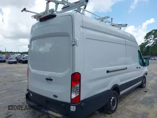 2024 Ford Transit Cargo with VIN 1FTBR3X86RKA46123, listed as a IAAI auction lot 42490695 with 13,258 mi miles and . Bid and sale history available at DreamBid. Image 4.