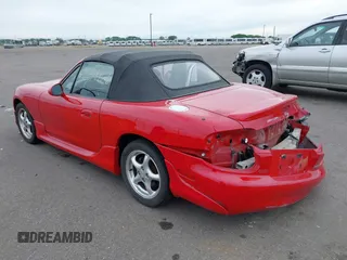 2002 Mazda MX-5 Miata Cloth with VIN JM1NB353220229173, listed as a IAAI auction lot 42344106 with 153,242 mi miles and . Bid and sale history available at DreamBid. Image 3.