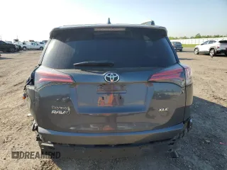 2018 Toyota RAV4 XLE with VIN 2T3WFREV0JW517488, listed as a Copart auction lot 51000975 with 68,105 mi miles and Salvage title. Bid and sale history available at DreamBid. Image 6.