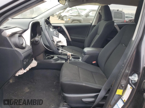 2018 Toyota RAV4 LE with VIN JTMBFREVXJJ226235, listed as a Copart auction lot 52299325 with 102,652 mi miles and Salvage Title. Bid and sale history available at carsss.com. Image 7.