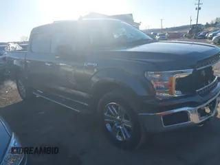 2019 Ford F-150 XL with VIN 1FTEW1E58KFA03971, listed as a IAAI auction lot 41565825 with 63,306 mi miles. Bid and sale history available at carsss.com. Image 1.