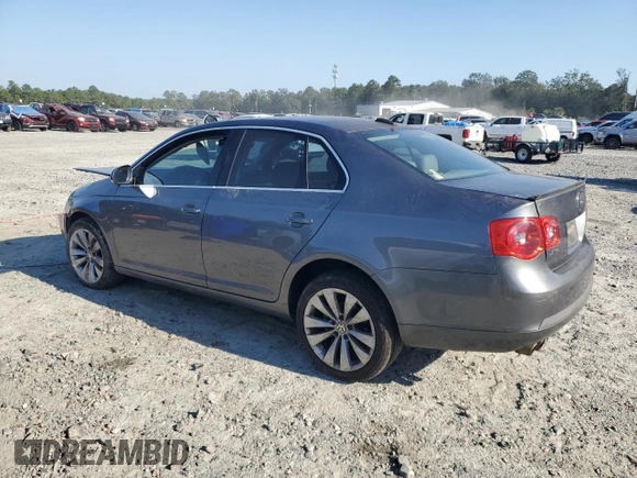 2006 Volkswagen Jetta z VIN 3VWDG71K26M673879, wystawiony jako Copart lot #75674634 z przebiegiem 93 689 mil mil oraz Szkoda całkowita • Salvage title. Historia ofert i sprzedaży dostępna na DreamBid. Obrazek 2.