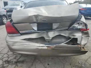 2005 Ford Crown Victoria LX z VIN 2FAFP74W95X147431, wystawiony jako Copart lot #73487374 z przebiegiem 203 107 mil mil oraz Nie do naprawy • Non repairable. Historia ofert i sprzedaży dostępna na DreamBid. Obrazek 6.