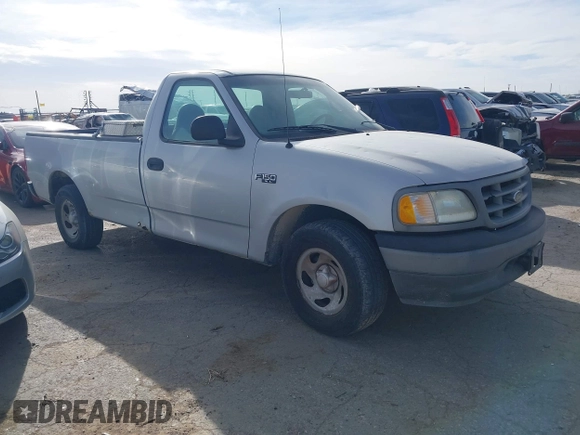 2002 Ford F-150 XL with VIN 3FTRF17212MA13777, listed as a IAAI auction lot 40977321 with 1 mi miles. Bid and sale history available at carsss.com. Image 1.