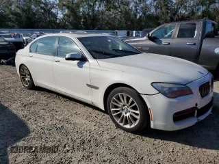 2014 BMW 7 Series 740Li xDrive with VIN WBAYF4C58ED281977, listed as a Copart auction lot 44084005 with 154,592 mi miles and Clean Title. Bid and sale history available at carsss.com. Image 4.