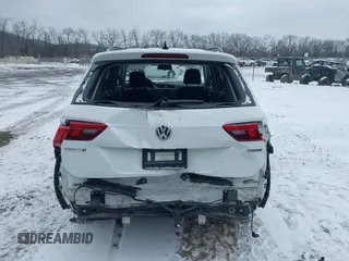 2021 Volkswagen Tiguan S with VIN 3VV0B7AX0MM092097, listed as a IAAI auction lot 41612128 with 49,525 mi miles and . Bid and sale history available at DreamBid. Image 17.
