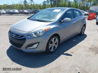 2013 Hyundai Elantra GT with VIN KMHD35LE9DU058163, listed as a IAAI auction lot 42067923 with 180,638 mi miles. Bid and sale history available at carsss.com. Image 2.