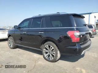 2020 Ford Expedition Platinum with VIN 1FMJU1MT8LEA69203, listed as a Copart auction lot 73598164 with 66,925 mi miles and Salvage Title. Bid and sale history available at carsss.com. Image 2.