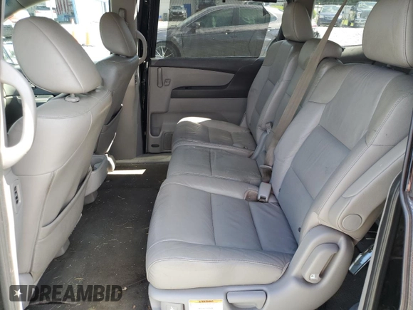2011 Honda Odyssey Touring с VIN 5FNRL5H95BB011577, выставлен на аукционе Copart как лот 58445085 с пробегом 150 797 миль миль и Чистый • Clean title. История ставок и продаж доступна на DreamBid. Изображение 11.