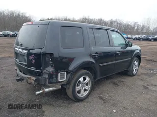 2013 Honda Pilot EX-L with VIN 5FNYF4H71DB021487, listed as a IAAI auction lot 41272308 with 188,217 mi miles and . Bid and sale history available at DreamBid. Image 4.