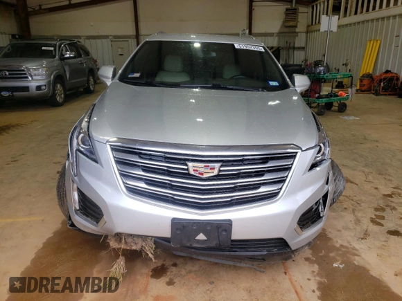 2019 Cadillac XT5 FWD with VIN 1GYKNARS1KZ231504, listed as a Copart auction lot 51952355 with 54,243 mi miles and Salvage title. Bid and sale history available at DreamBid. Image 5.