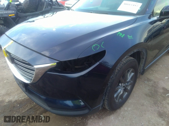2021 Mazda CX-9 Sport with VIN JM3TCBBY4M0519407, listed as a IAAI auction lot 40883497 with 90,205 mi miles and . Bid and sale history available at carsss.com. Image 6.