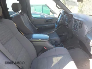 2002 Ford F-150 XL with VIN 1FTRX17L32NA13159, listed as a IAAI auction lot 41653814 with 435,395 mi miles. Bid and sale history available at carsss.com. Image 5.