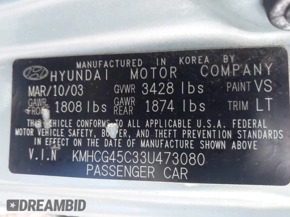 2003 Hyundai Accent GL with VIN KMHCG45C33U473080, listed as a IAAI auction lot 41868765 with 57,478 mi miles. Bid and sale history available at carsss.com. Image 9.