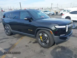 2023 Rivian R1S Launch Edition with VIN 7PDSGABL5PN008523, listed as a IAAI auction lot 40987625 with 26,058 mi miles. Bid and sale history available at carsss.com. Image 1.